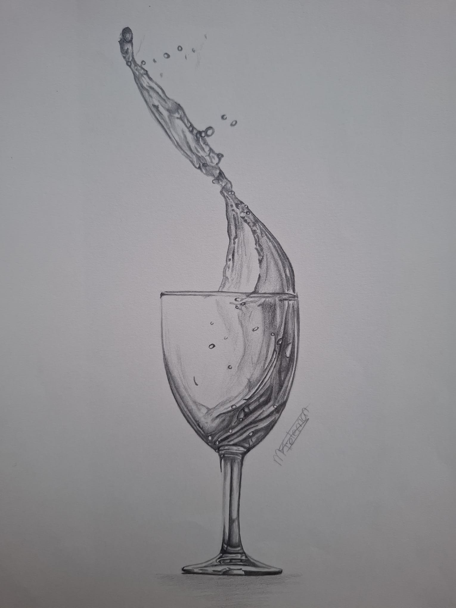 Overgietend wijnglas met water